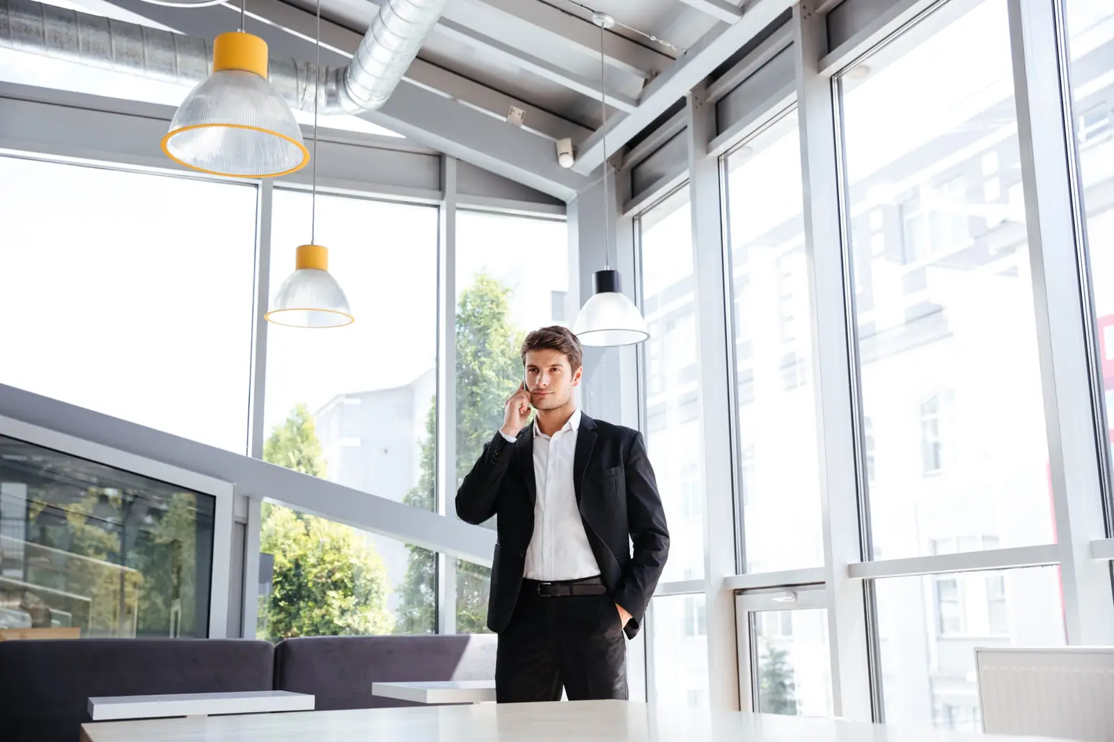 A manager on a call in the office