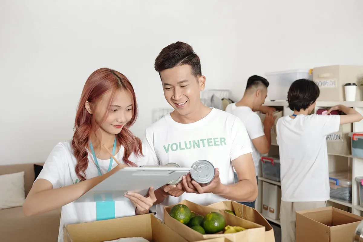 Volunteers working in a charity center